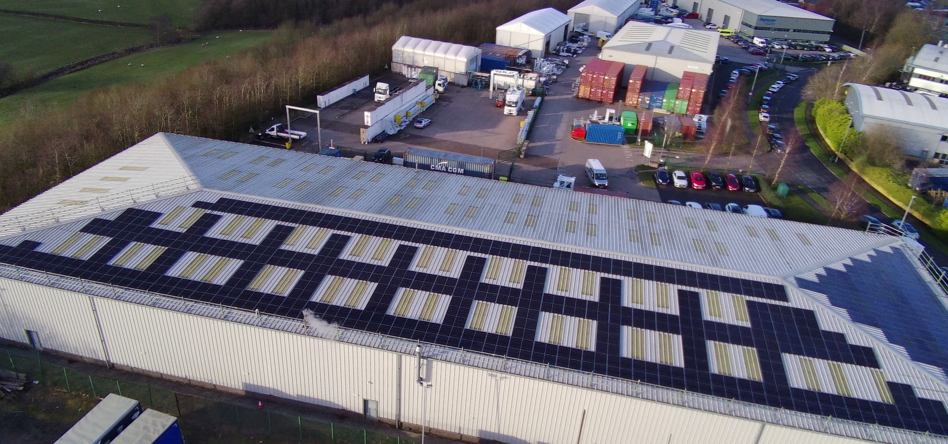 Drone view of a Green Tech Hub commercial rooftop solar installation