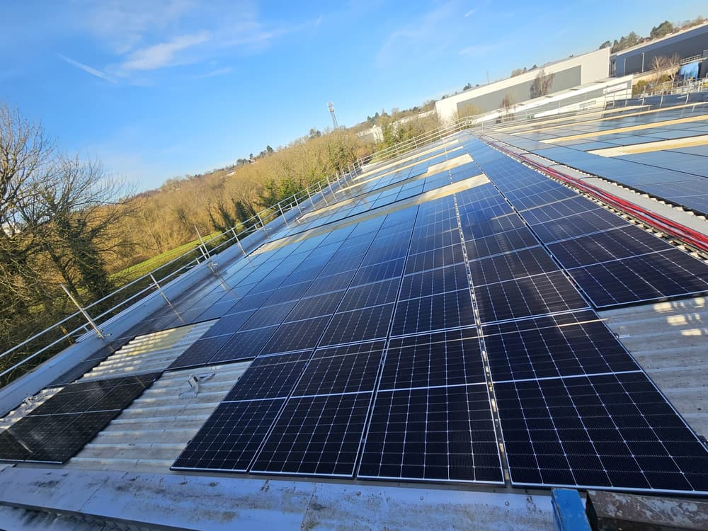 Solar panels being installed across the Harris Parts warehouse roof