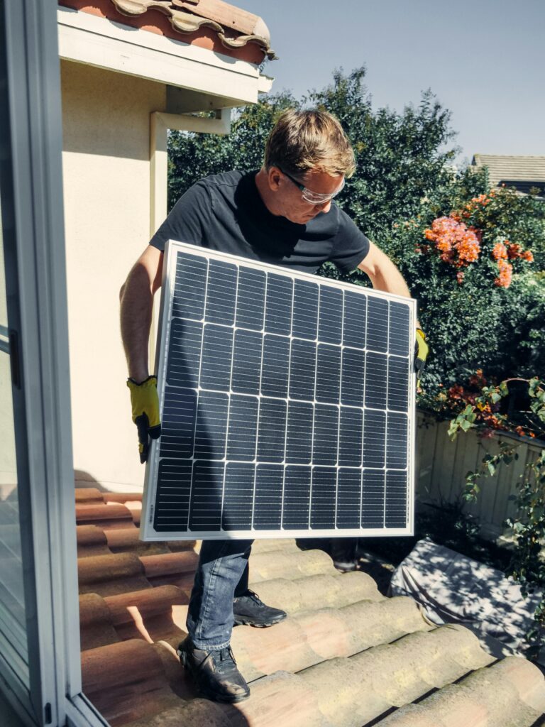man with solar panel